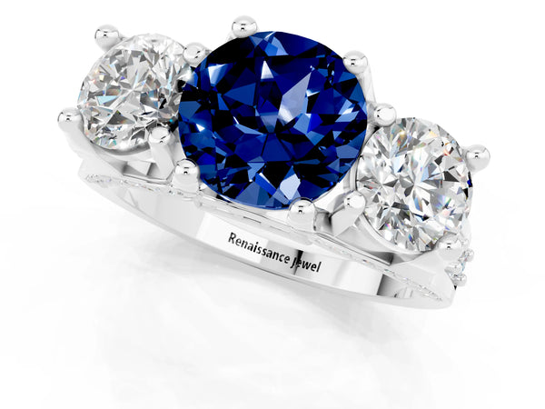 White gold Round Cut Blue Sapphire Three-Stone Ring with Channel Set Band and Four-Prong Setting