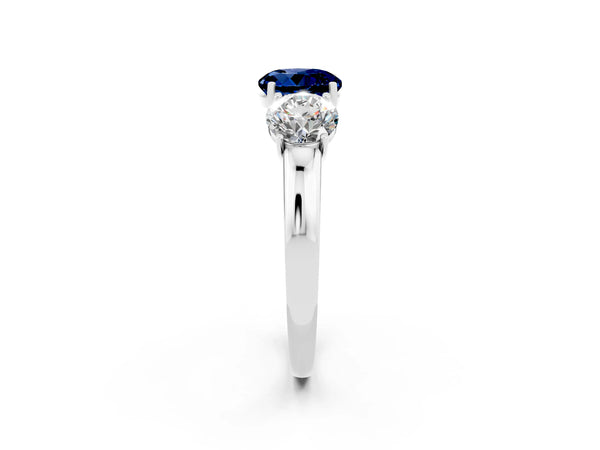 White gold Round Cut Blue Sapphire Three-Stone Ring with Four-Prong Setting and Classic Band