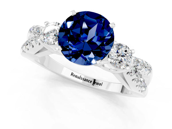White gold Round Cut Blue Sapphire Three-Stone Ring with Pavé Split Shank and Four-Prong Setting