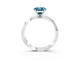 White gold Round Cut Blue Topaz Engagement Ring with Side Stone Accents and Four-Prong Setting_63