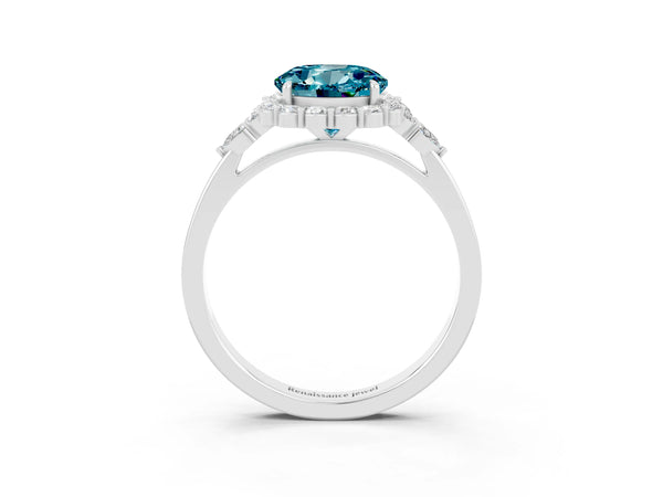 Platinum Round Cut Blue Topaz Halo Ring with Pear Side Stones and Prong Setting