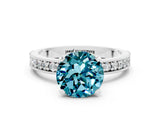 White gold Round Cut Blue Topaz Milgrain Pavé Engagement Ring with Four-Prong Setting