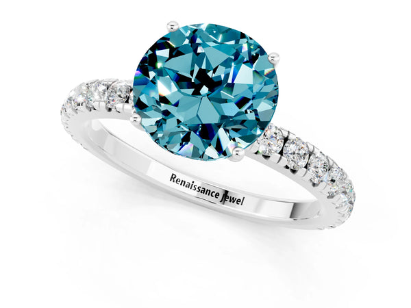 White gold Round Cut Blue Topaz Pavé Solitaire Engagement Ring with Four-Prong Setting