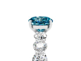 White gold Round Cut Blue Topaz Prong Setting with Side Stones on a Pave Band_5