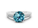 White gold Round Cut Blue Topaz Ring with Milgrain Pavé Band and Four-Prong Setting_12