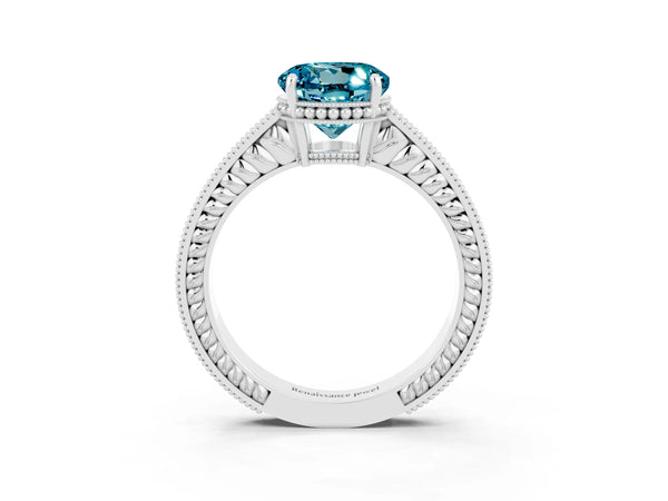 Silver Round Cut Blue Topaz Ring with Milgrain Pavé Band and Four-Prong Setting