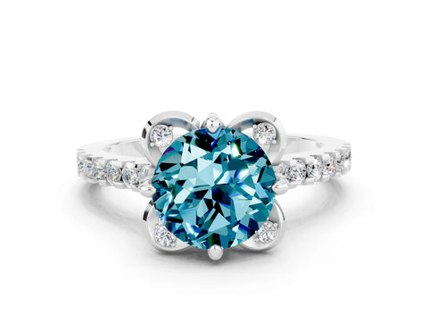 White gold Round Cut Blue Topaz Ring with Pavé Band and Floral Prong Setting