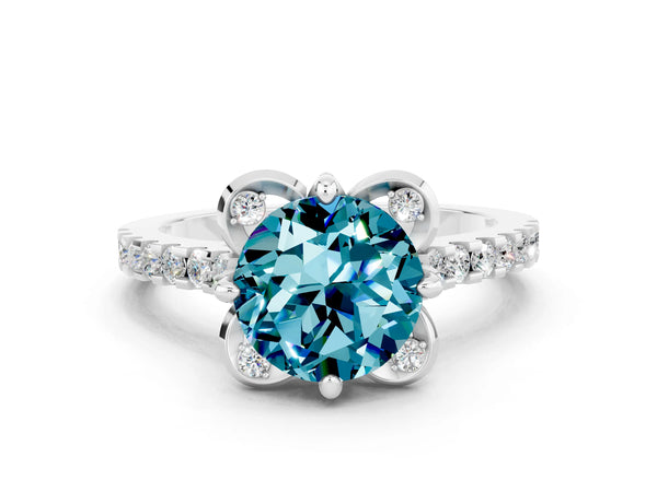 White gold Round Cut Blue Topaz Ring with Pavé Band and Floral Prong Setting