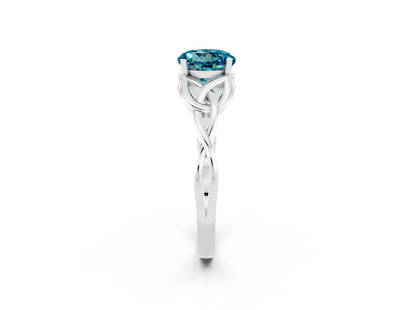 Platinum Round Cut Blue Topaz Solitaire Celtic Knot Ring with Four-Prong Setting
