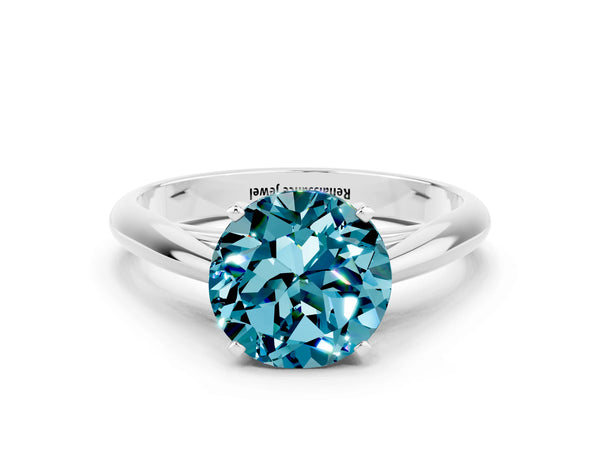 Silver Round Cut Blue Topaz Solitaire Engagement Ring with Cathedral Setting and Four-Prong Mount