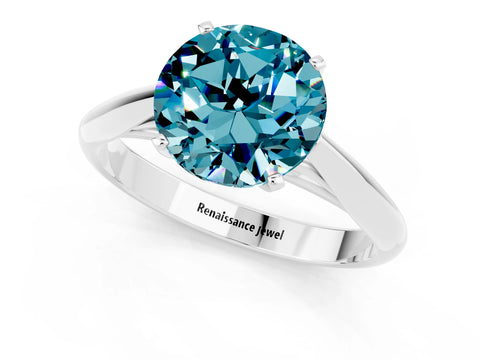 White gold Round Cut Blue Topaz Solitaire Engagement Ring with Cathedral Setting and Four-Prong Mount_13