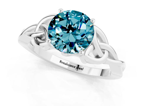 White gold Round Cut Blue Topaz Solitaire Engagement Ring with Celtic Knot Band and Four-Prong Setting_1