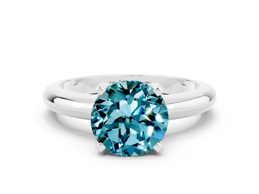 White gold Round Cut Blue Topaz Solitaire Engagement Ring with Round Band and Four-Prong Setting