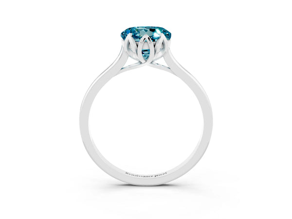 Platinum Round Cut Blue Topaz Solitaire Ring with Flower Prong Setting and Classic Band