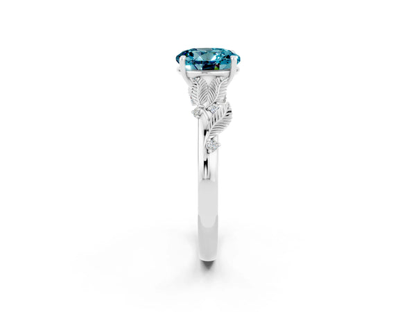 Silver Round Cut Blue Topaz Solitaire Ring with Leaf Motif Band and Four-Prong Setting