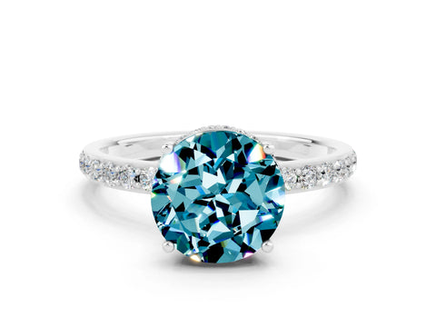 White gold Round Cut Blue Topaz Solitaire Ring with Pavé Band and Hidden Halo