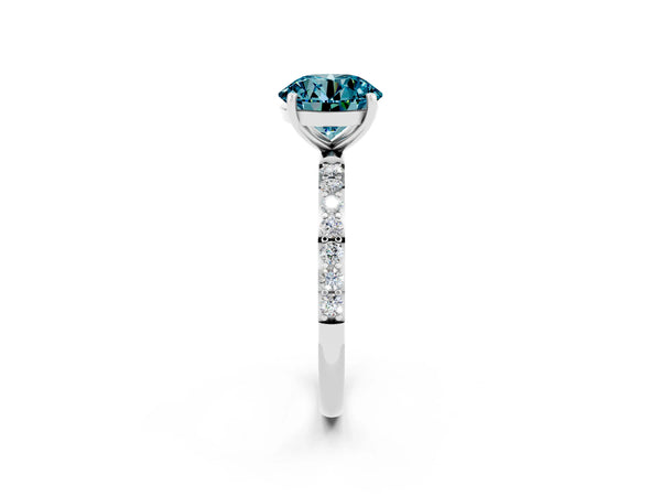 Platinum Round Cut Blue Topaz Solitaire Ring with Round  Pavé Band and Prong Setting