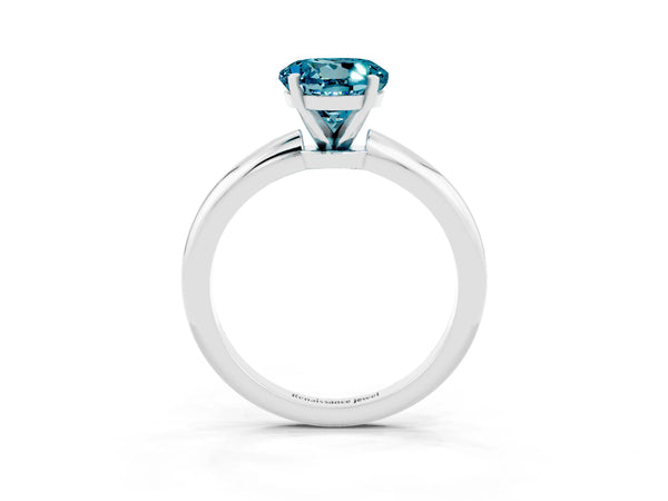 Platinum Round Cut Blue Topaz Solitaire Ring with Six-Prong Setting and Classic Band