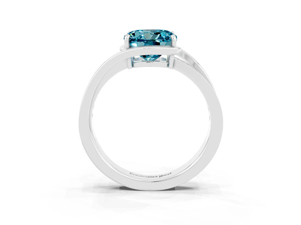 Platinum Round Cut Blue Topaz Solitaire Ring with Split Shank and Prong Setting