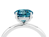 White gold Round Cut Blue Topaz Solitaire Ring with Thin Band and Four-Prong Setting_16