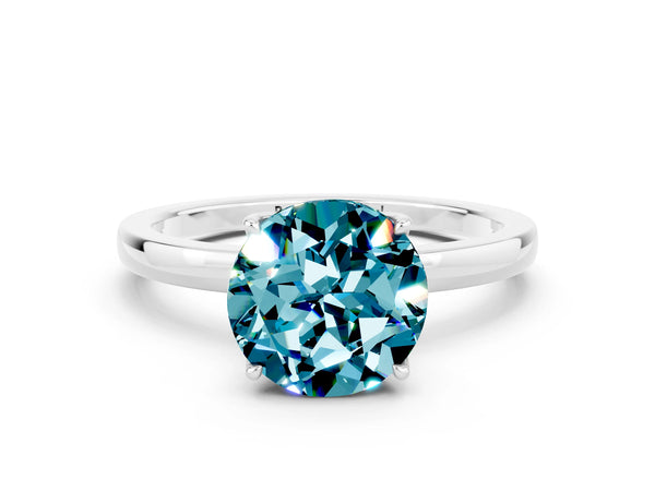 Silver Round Cut Blue Topaz Solitaire Ring with Thin Band and Prong Setting