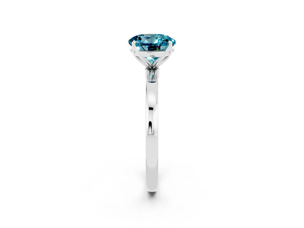 Platinum Round Cut Blue Topaz Solitaire Ring with Thin Band and Prong Setting