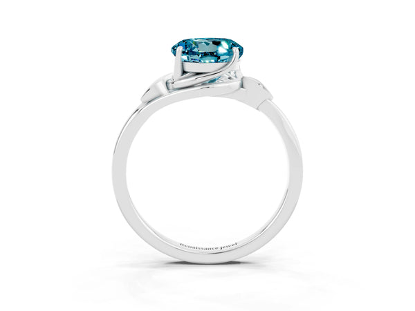 Platinum Round Cut Blue Topaz Solitaire Ring with Twist Band and Four-Prong Setting