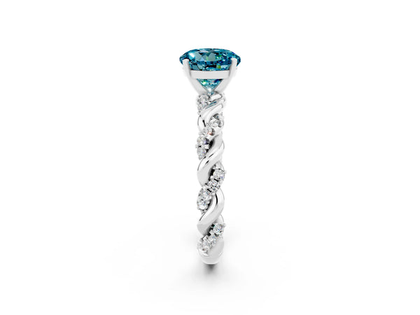 Platinum Round Cut Blue Topaz Solitaire Ring with Twisted Band and Pavé Accents