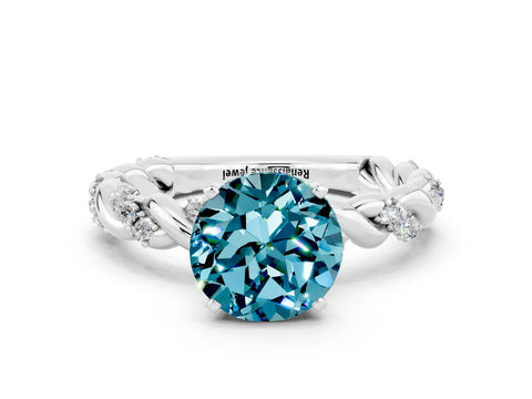 White gold Round Cut Blue Topaz Solitaire Ring with Twisted Band and Pavé Accents