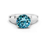 White gold Round Cut Blue Topaz Solitaire Ring with Wide Band and Prong Setting
