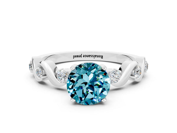 Platinum Round Cut Blue Topaz Solitaire Twisted Band with Round  Accents and Prong Setting
