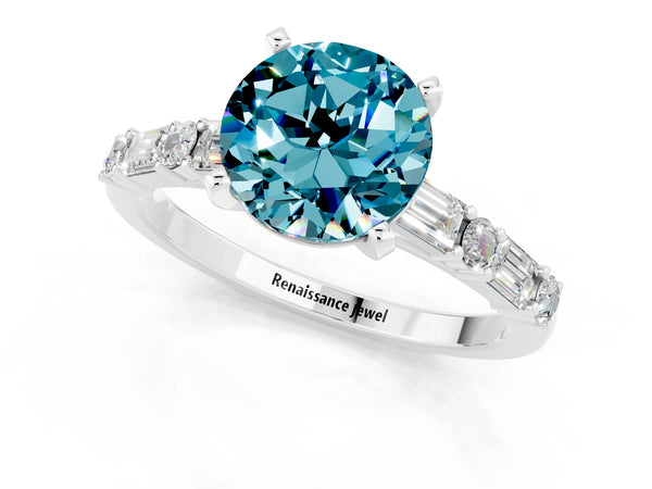 White gold Round Cut Blue Topaz Solitaire with Side Baguettes and Channel Set Band
