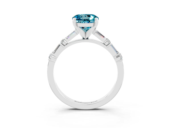 Platinum Round Cut Blue Topaz Solitaire with Side Baguettes and Channel Set Band
