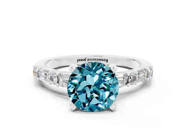 Silver Round Cut Blue Topaz Solitaire with Side Baguettes and Channel Set Band