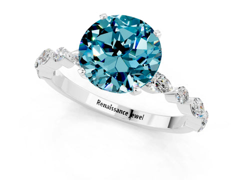 White gold Round Cut Blue Topaz Solitaire with Side Stones on a Pavé Band and Four-Prong Setting_1