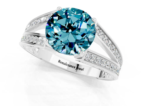 White gold Round Cut Blue Topaz Split Shank Ring with Pavé Band and Four-Prong Setting_1