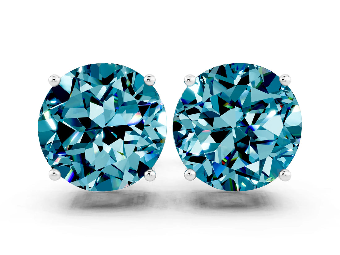 Silver 0.63 Carat Round Blue Topaz Stud Earrings