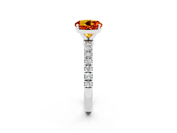 Platinum Round Cut Citrine Solitaire Ring with Pavé Accents and Four-Prong Setting