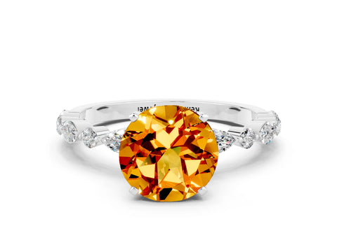 White gold Round Cut Citrine Solitaire with Side Stones on a Pavé Band and Four-Prong Setting