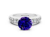 White gold Round Cut Cut Channel Set Diamond Engagement Ring with Four-Prong Setting