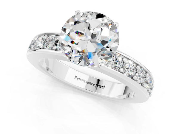 Platinum Round Cut Moissanite Engagement Ring with Channel Set Round Band and Prong Setting