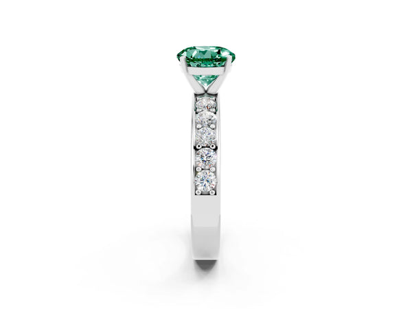 Platinum Round Cut Green Sapphire Engagement Ring with Channel Set Round Band and Prong Setting