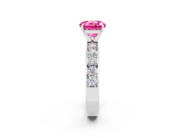Platinum Round Cut Pink Sapphire Engagement Ring with Channel Set Round Band and Prong Setting
