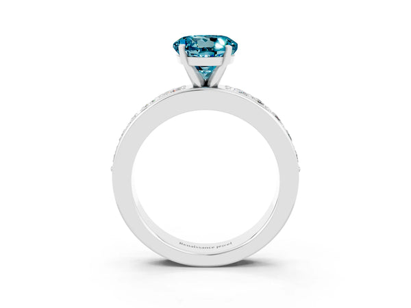 Platinum Round Cut Blue Topaz Engagement Ring with Channel Set Round Band and Prong Setting