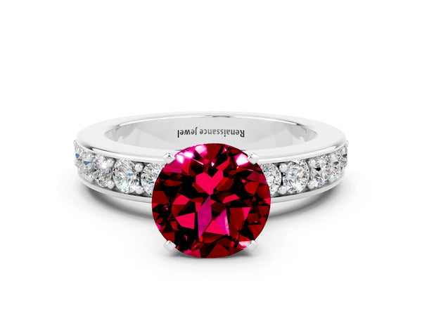 Silver Round Cut Garnet Engagement Ring with Channel Set Round Band and Prong Setting