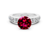 White gold Round Cut Cut Channel Set Diamond Engagement Ring with Four-Prong Setting