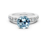 White gold Round Cut Cut Channel Set Diamond Engagement Ring with Four-Prong Setting