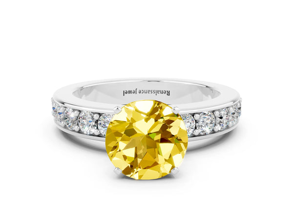 Platinum Round Cut Yellow Sapphire Engagement Ring with Channel Set Round Band and Prong Setting