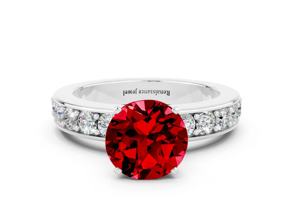 Silver Round Cut Ruby Engagement Ring with Channel Set Round Band and Prong Setting
