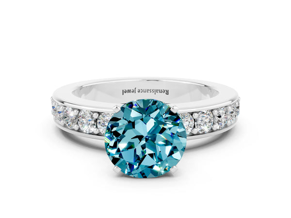 White gold Round Cut Blue Topaz Engagement Ring with Channel Set Round Band and Prong Setting